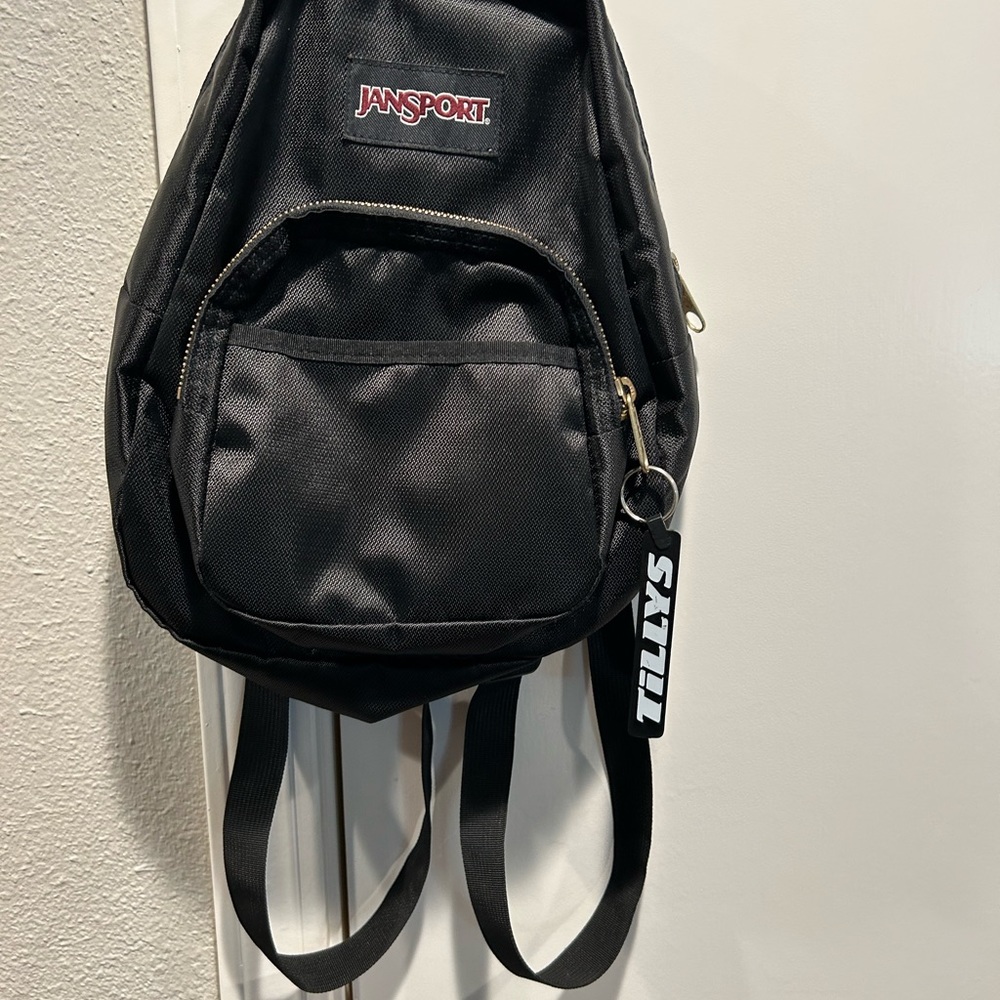 Mini black Jansport backpack
